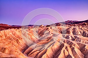 Badlands view from Zabriskie Point in Death Valley National Park at Dusk