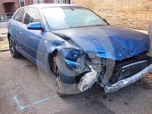 Badly damaged car in an accident.