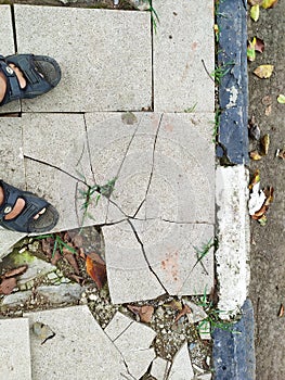 badly damaged pavement due to poor workmanship