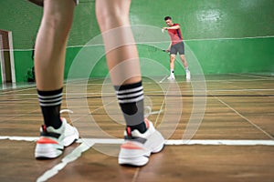 badminton player& x27;s feet when playing badminton with his opponent