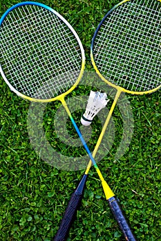 Badminton racket on grass