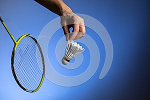 Badminton racket and shuttlecock in motion