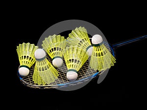 Badminton racket wit yellow shuttlecock isolat