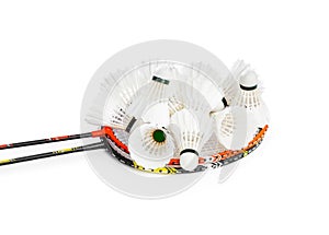 Badminton rackets and feather shuttlecocks