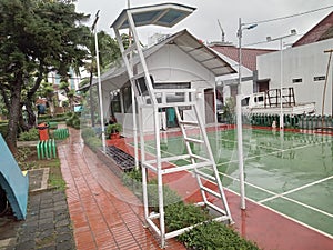 A badminton referee's chair