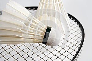Badminton shuttlecocks on the racket. Horizontal