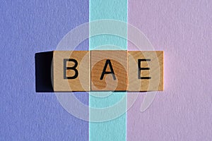 BAE Before Anyone Else, in 3d wooden alphabet letters isolated on colourful background