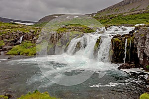 Baejarfoss waterfall in Iceland as the last step below the famous Dynjandi fall