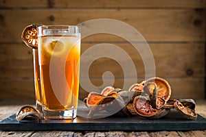 Bael juice ice tea on wooden table , healthy drink