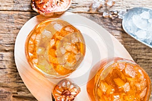 Bael juice ice tea on wooden table , healthy drink