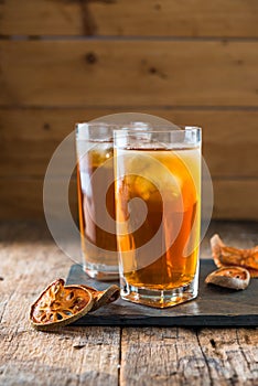 Bael juice ice tea on wooden table , healthy drink