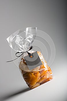 Bag of apricots with black blank label and copy space