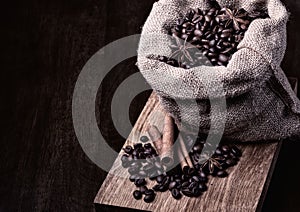 Bag of black coffee beans