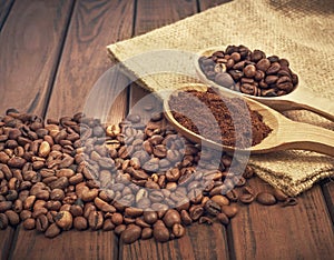 Bag of coffee beans scattered