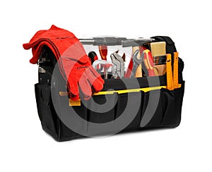 Bag with different construction tools isolated on white