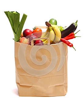 Bag full of healthy fruits and vegetables photo