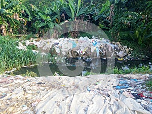 Bag laundry in stream for informal recycling