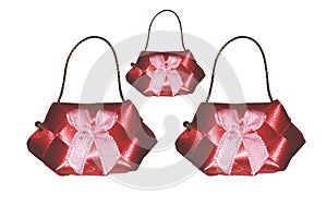 The bag model is made of cute red ribbon separating with white ground