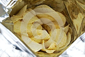 Bag of potato chips or packet of crisps