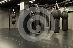 bag punching boxing training exercise, for competition kick for punch for bags impact, red club. Ring activity dark,