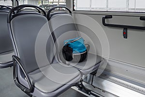 A bag on the seat in bus