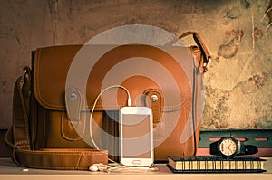 Bag and stationary on table