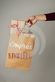 Bag with the text christmas shopping in spanish photo