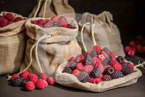 bag of wild raspberries and blackberries. Generative AI