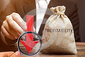 Bag with the word Profitability and a down arrow with a businessman. Low economic efficiency and profitableness. Drop in profits