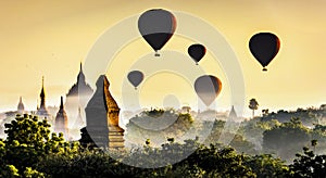 Bagan Pagoda and Tourist Balloons in the morning mist , Bagan, Myanmar