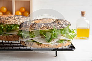 Bagel with chicken roll, green salad and cream cheese