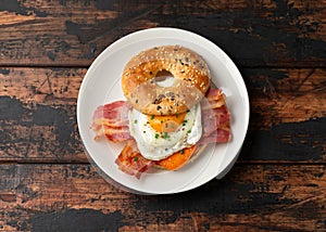 Bagel sandwich with bacon, egg and cheese. Breakfast