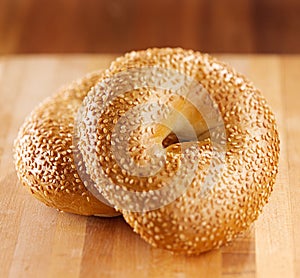 Bagel on wooden board.