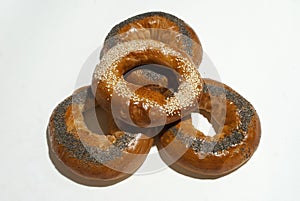 Bagels with poppy seeds and sesame seeds.