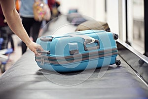 Baggage claim luggage conveyor belt at airport