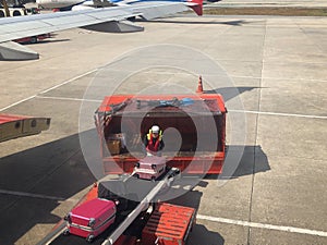 Baggage handlers working at Don Mueang International Airport