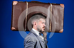 Baggage insurance. Travel and baggage concept. Man well groomed bearded hipster with big suitcase. Take all your things