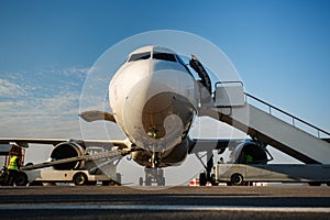 Baggage is loading into of the aircraft