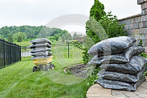 Bagged Mulches on Table and Wagon at the Backyard