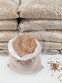 Bagged wood pellets in storage