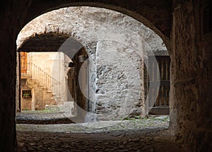 Bagolino medieval village, arched under passage. photo