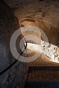 Bagolino medieval village, arched under passage. photo