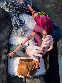 Bagpipe player outdoors