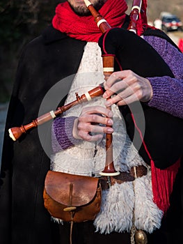Bagpipe player outdoors