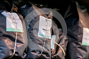 Bags of coffee in store shelf