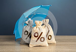 Bags of deposits under the insurance umbrella. photo