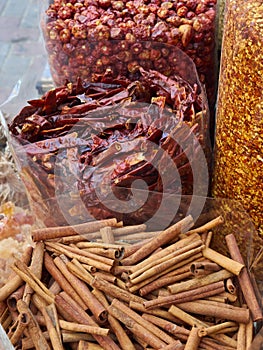 Bags of dried chillies and cinnamon sticks