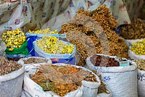 Bags of dried herbal tea for sale at city local market. Lahic. Azerbaijan