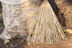 Bags of dry leaves and broom