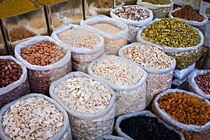 Bags of nuts, seeds and ingredients for sale on food market Suq, Damascus photo